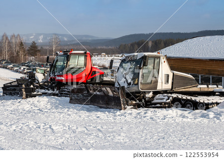 Several snowcats at ski resort in winter Several snowcats at ski resort in winter 122553954