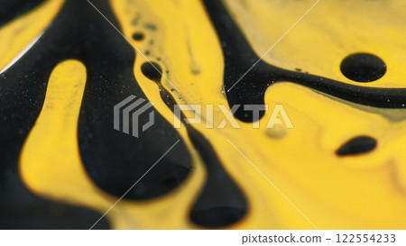Blur gel bubbles. Sparkling fluid. Defocused yellow black color shiny glowing particles viscous oil spill drip texture paint ink water mix on abstract art background. 122554233