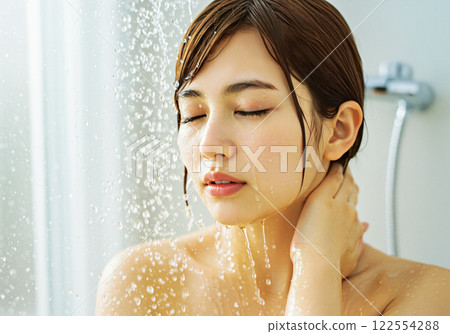 Young woman taking a pleasant shower 122554288