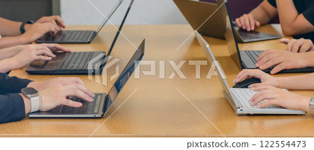Men and women having a meeting in the office, business scene, IT company Men and women having a meeting in the office, business scene, IT company 122554473