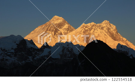 Bright lit Mount Everest, Lhotse and Nuptse, view from Gokyo Ri, Nepal. 122554518