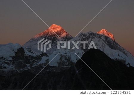 Bright lit peaks of Mount Everest, Lhotse and Nuptse, Nepal. 122554521