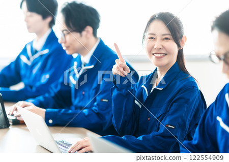 The middle-aged woman from a transportation company who poses first 122554909