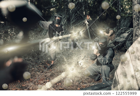 Impudent teams facing on battlefield in outdoor paintball arena during match Impudent teams facing on battlefield in outdoor paintball arena during match 122555999