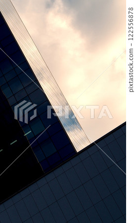 Modern Architectural Design with Dynamic Angles and Soft Sunset Glow 122556878