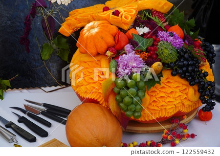 Dessert table on wedding with tasty cakes, cookies and sweets in pastel colors. Professional catering and servings. Festive atmosphere. 122559432