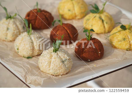 Dessert table on wedding with tasty cakes, cookies and sweets in pastel colors. Professional catering and servings. Festive atmosphere. Dessert table on wedding with tasty cakes, cookies and sweets in pastel colors. Professional catering and servings. Festive atmosphere. 122559459