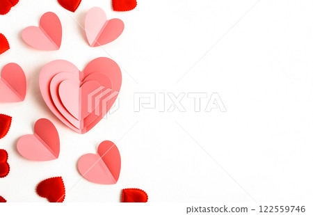 Background for Valentine's Day. Pink hearts and flowers on a light background. Flat layout and a place to copy 122559746