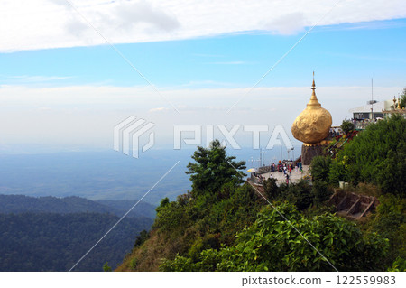 Famous landmark of Myanmar - Golden Rock at sunset. Kyaiktiyo (Kyaikhtiyo) Pagoda, buddhist pilgrimage site in Mon State. Treasure of Buddhism in mountains, Burma 122559983