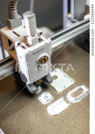 3D printing machine, 3D printer prints a new model 3D printing machine, 3D printer prints a new model 122560444