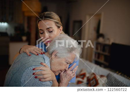 Psychologist provides mental health support and grief counseling to elderly patient. 122560722