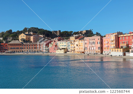 Sestri Levante, Italy - January 17, 2025. View from rock on sea, Bay of Silence, fishing cove, Italy. Tourism and recreation. Ecologically clean nature. Traditional old buildings. Historical center. 122560744