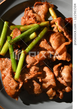 Stir-fried pork and garlic sprouts with oyster Stir-fried pork and garlic sprouts with oyster 122561504