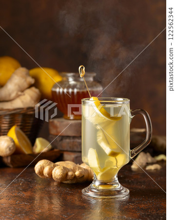 Ginger tea with lemon and honey. 122562344