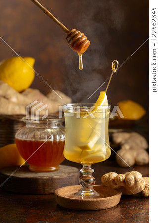 Ginger tea with lemon and honey. 122562345