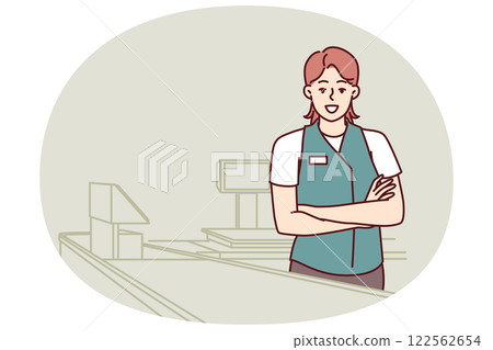 Woman supermarket cashier stands in checkout area of store with proudly arms crossed 122562654