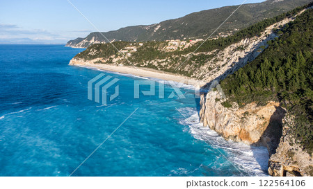 Aerial view in the golden hour of empty beautiful Mylos Beach. Lefkada. Greece Aerial view in the golden hour of empty beautiful Mylos Beach. Lefkada. Greece 122564106