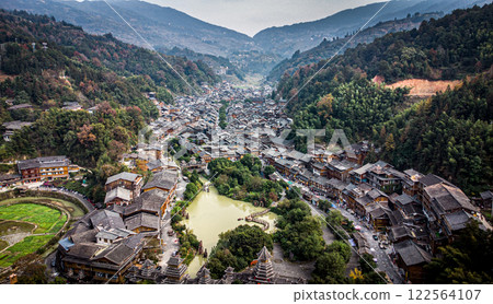 Aerial view of Zhaoxing Dong Village. Valley surrounded by mountains in China Aerial view of Zhaoxing Dong Village. Valley surrounded by mountains in China 122564107