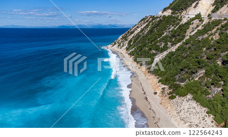 Aerial view of magnificent Tsoukalades beach. Pristine waters. Lefkada. Greece Aerial view of magnificent Tsoukalades beach. Pristine waters. Lefkada. Greece 122564243