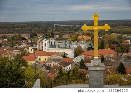 Sremski Karlovci overseen by Orthodox golden cross. Serbia. Vojvodina. 122564355