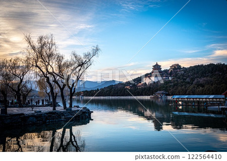 Summer Palace lake with lush trees and stunning mountains. Beijing, China. 122564410