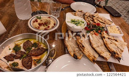 Food. Tyre, Lebanon. Kefta, Labneh, Naan, Hummus, pomegrenate. Lebanese Cuisine Food. Tyre, Lebanon. Kefta, Labneh, Naan, Hummus, pomegrenate. Lebanese Cuisine 122564421