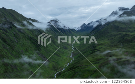 Aerial view of beautiful grassland mountain landscape Aerial view of beautiful grassland mountain landscape 122564568