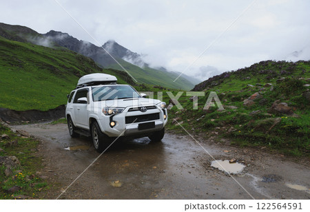 Driving car off road on high altitude mountains 625 122564591