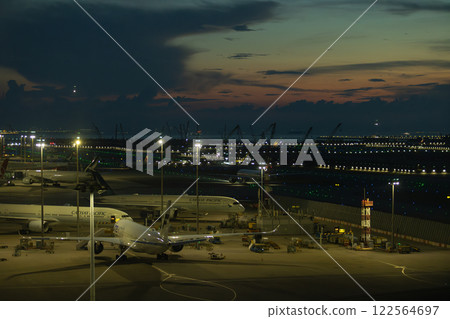 Cathay Pacific airline park in Hong Kong international airport. it is one of local airline brand in Hong Kong Cathay Pacific airline park in Hong Kong international airport. it is one of local airline brand in Hong Kong 122564697