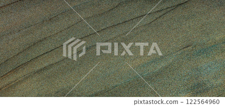 Elegant Abstract Texture with Subtle Green and Gold Tones Featuring Smooth Flowing Lines and Shimmering Finish 122564960