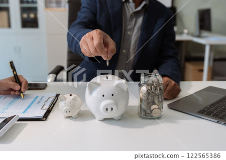 Business man thinking concept saving money and finance accounting. Business man thinking concept saving money and finance accounting. 122565386