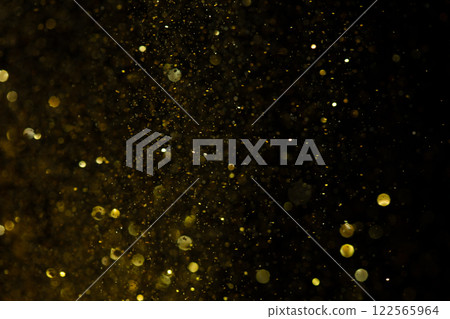 Photo of golden glitter powder sand creating abstract bokeh festive atmosphere. Bokeh of particle element of gold glitter sand light up luxury background, sparkle glow wallpaper Photo of golden glitter powder sand creating abstract bokeh festive atmosphere. Bokeh of particle element of gold glitter sand light up luxury background, sparkle glow wallpaper 122565964