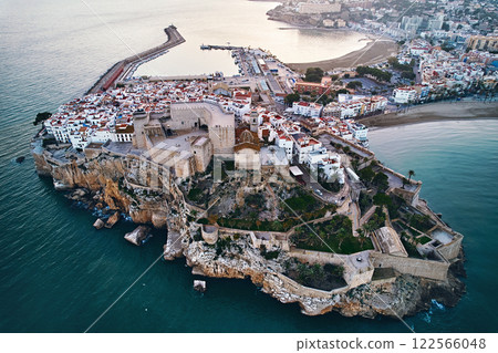 Breathtaking aerial view of Peniscola, historic coastal town in Spain at sunset Breathtaking aerial view of Peniscola, historic coastal town in Spain at sunset 122566048
