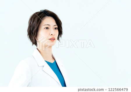 A woman in a white coat 122566479