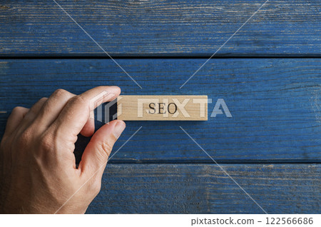 Wooden tag with SEO sign on it 122566686