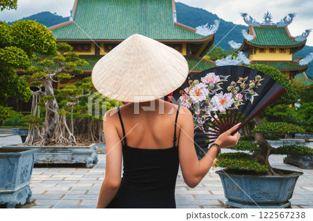 woman tourist traveler at Buddhist temple at Linh Ung Pagoda in Da Nang in Vietnam. Concept of travel and tourism in Asia 122567238