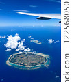 View of Tarama Island and Minna Island in Okinawa from above. Beautiful summer sky, sea and sky spread out. Photographed in 2024. 122568050