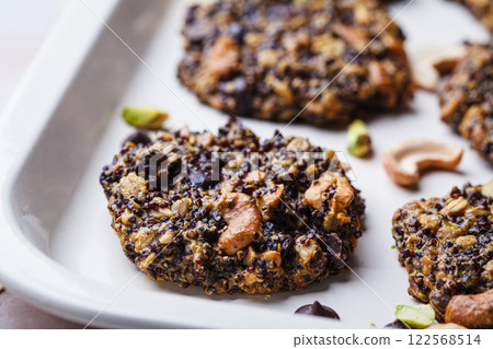 Healthy quinoa cookies with nuts and chocolate. Healthy quinoa cookies with nuts and chocolate. 122568514