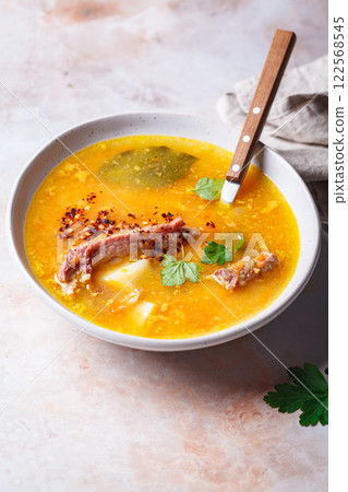 Split pea soup with smoked ribs. 122568545