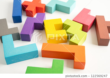 Logical thinking and problem solving creative business solution concept, wooden puzzle geometric shape block shape. 122569247