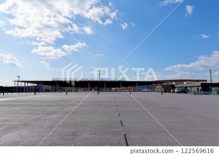 The East Gate of the EXPO 2025 Osaka Kansai Expo awaits its opening at Yumeshima in Konohana Ward, Osaka City 122569616
