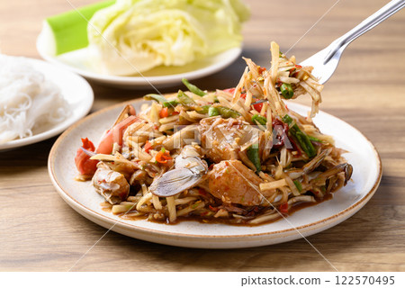 Spicy papaya salad with blue crab (Som Tum), Thai food Spicy papaya salad with blue crab (Som Tum), Thai food 122570495
