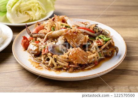 Spicy papaya salad with blue crab (Som Tum), Thai food Spicy papaya salad with blue crab (Som Tum), Thai food 122570500