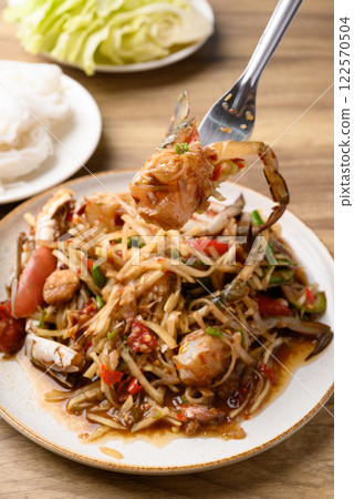 Spicy papaya salad with blue crab (Som Tum), Thai food Spicy papaya salad with blue crab (Som Tum), Thai food 122570504