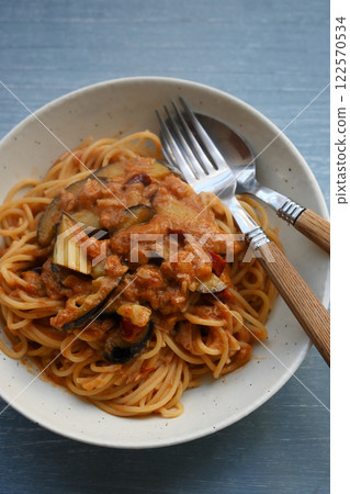 Tomato sauce pasta with eggplant and tuna 122570534