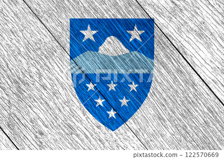 Official flag and coat of arms of Qeqqata. Greenland. Conceptual collage on wood texture Official flag and coat of arms of Qeqqata. Greenland. Conceptual collage on wood texture 122570669