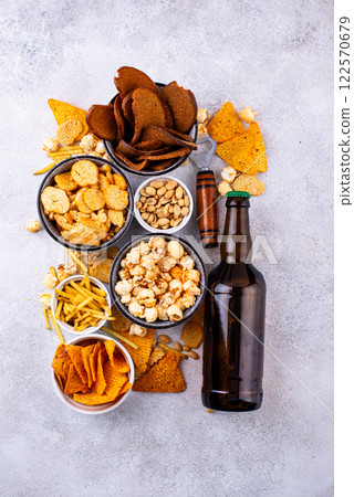Beer and different snacks for Superbowl or football party Beer and different snacks for Superbowl or football party 122570679