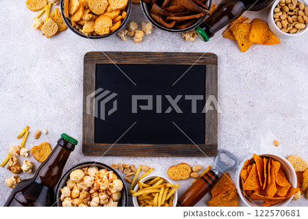Beer and different snacks for Superbowl or football party 122570681