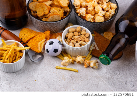 Beer and different snacks for Superbowl or football party Beer and different snacks for Superbowl or football party 122570691