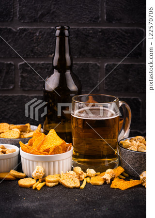 Beer and different snacks for Superbowl or football party Beer and different snacks for Superbowl or football party 122570706